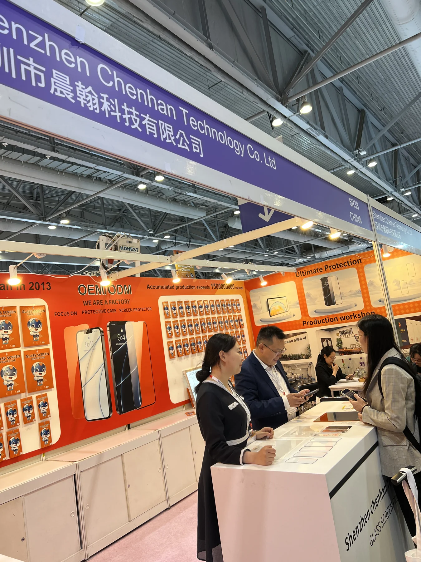 Chenhan representatives at an industry trade show
